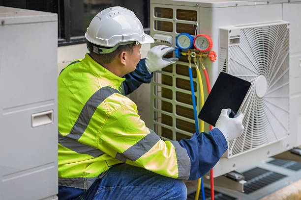 Professional Emergency Ac Repair technician working in Cowlesville, NY